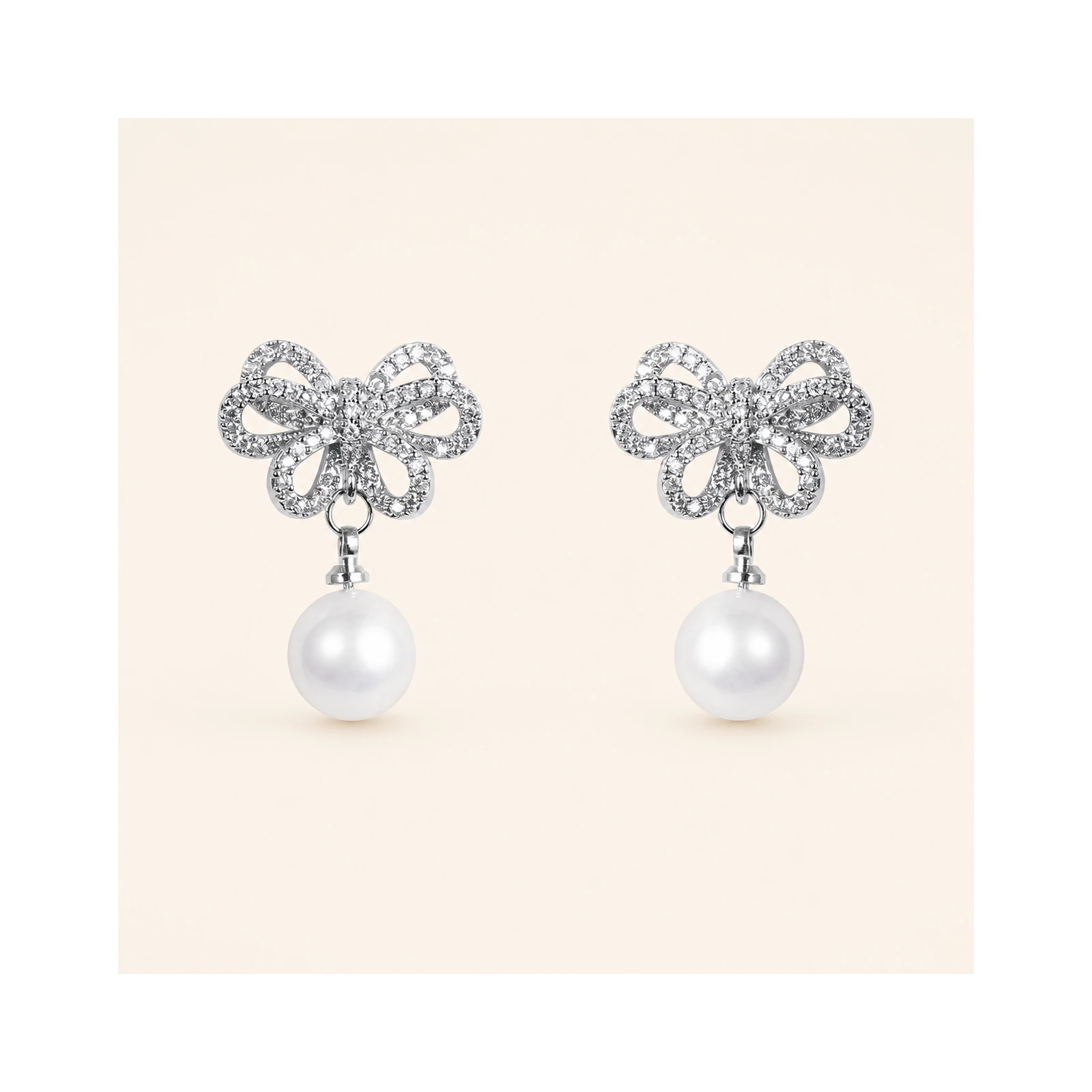 Silver Bow Pearl Drop Earrings